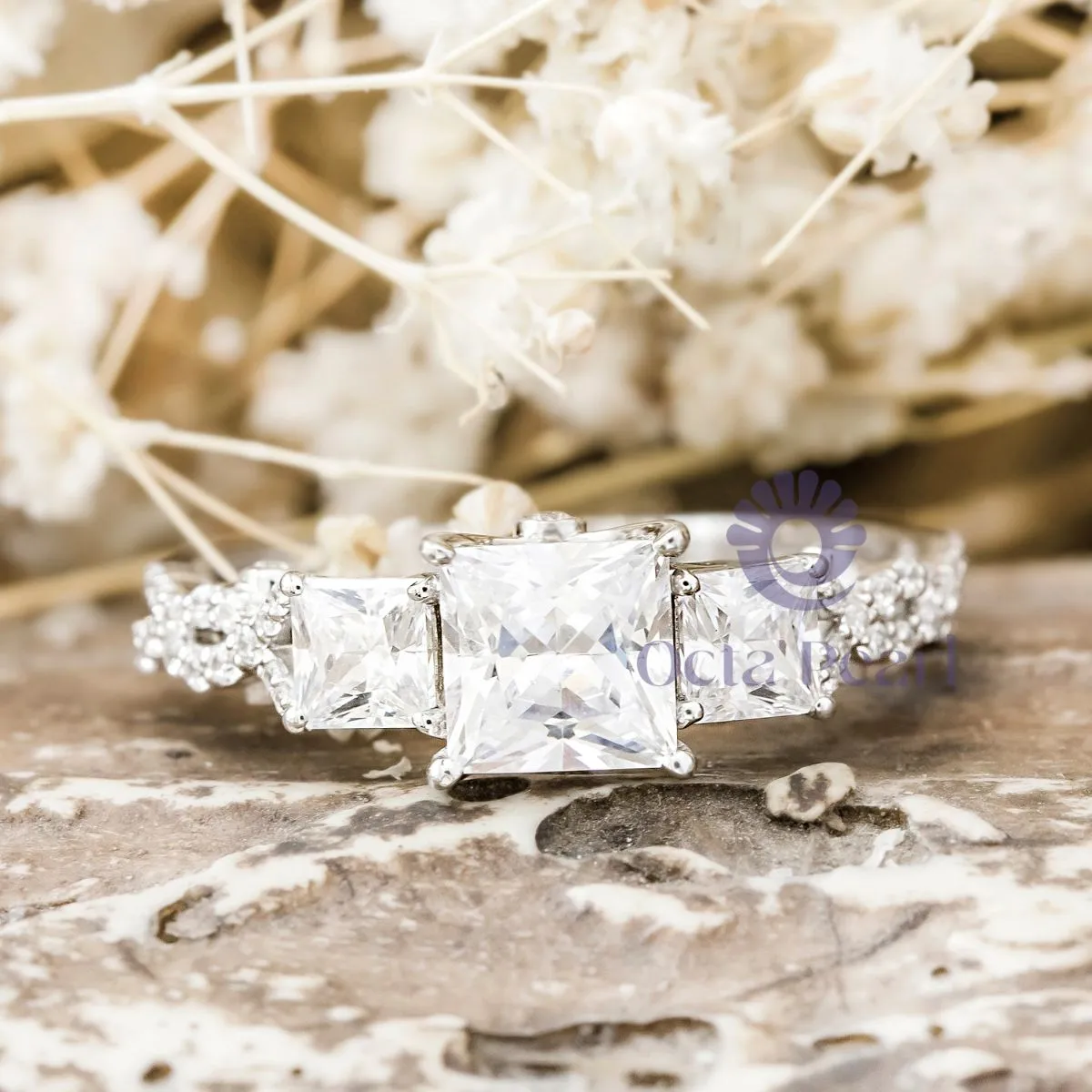 Princess CZ Three Stone Twisted Shank Wedding Ring